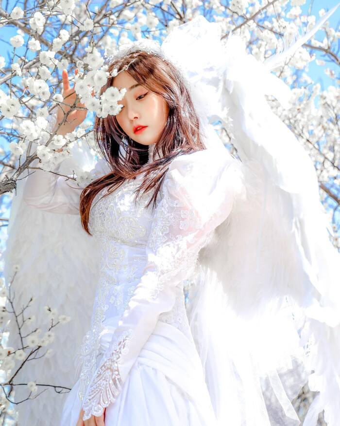 Angel floating in the white clouds , , , 