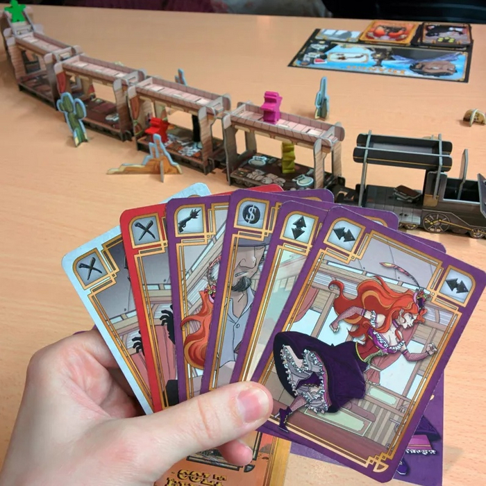 «Кольт экспресс» (изображение с сайта <!--noindex--><a href="https://pikabu.ru/story/top_100_nastolnyikh_igr_ot_mistera_lisa_8076_mesta_10627933?u=http%3A%2F%2Fboardgamegeek.com&t=boardgamegeek.com&h=9d63b2cdc996790a2ec86c4155af2e2ef2a3d62a" title="http://boardgamegeek.com" target="_blank" rel="nofollow noopener">boardgamegeek.com</a><!--/noindex-->)