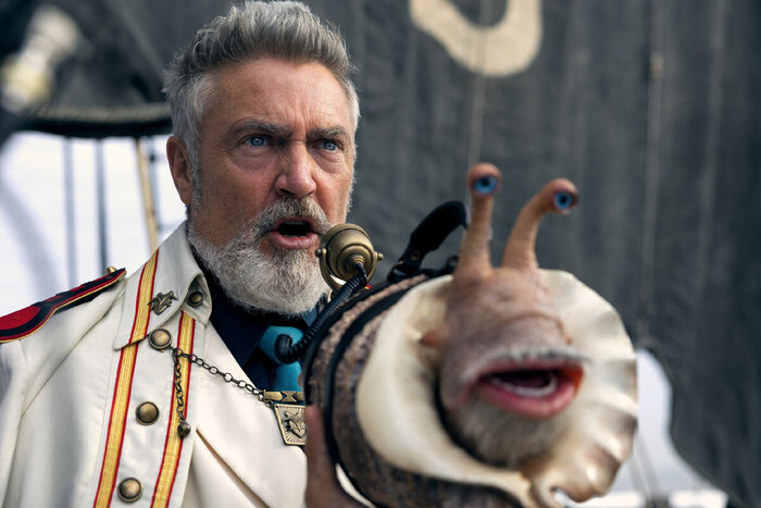 Да, вместо телефонов в мире "Ван-Писа" используют телепатических улиток.