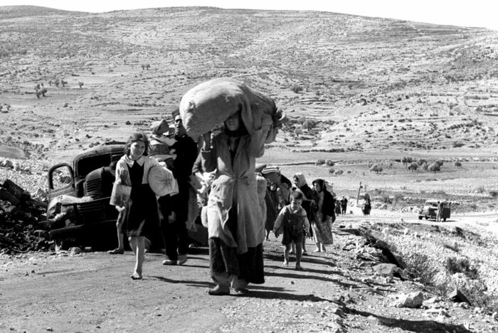 Palestinians flee from an unidentified village in the Galilee after Zionist attacks in 1948 (Reuters)