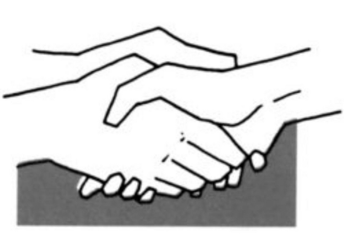 Обхватить руку собеседника двумя руками