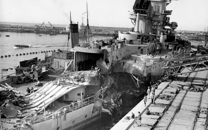 Повреждённый французский линкор Jean Bart у пристани
