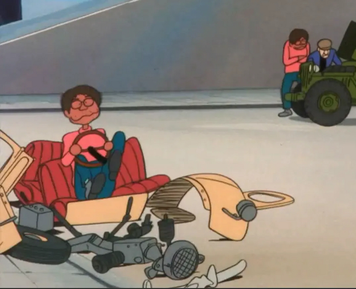 Сам Миядзаки за развалинами своей машины Ситроен 2CV